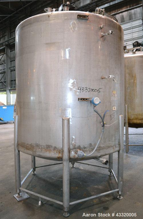 Used Tank, 1500 Gallon, 316 Stainless Steel, Vertical. Approximate 76” diameter x 72” straight side, dished top and bottom. Fixed stainless steel agitator mount with a UET agitator, model XCEL-6, out...