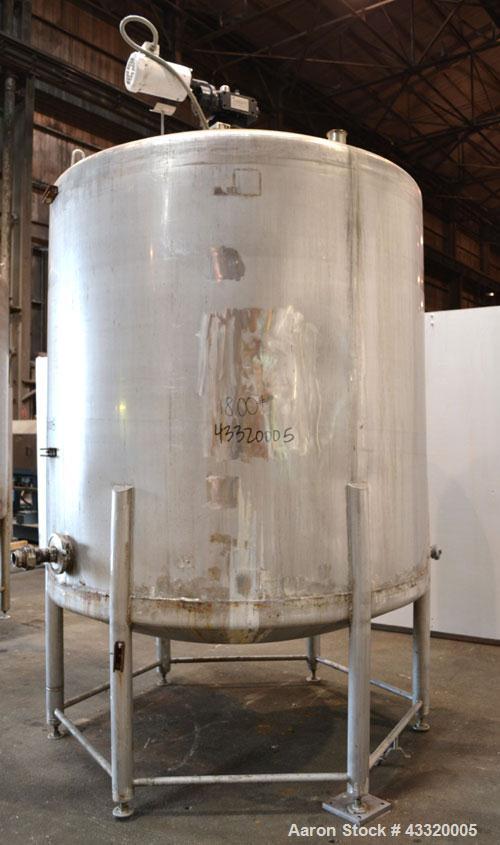 Used Tank, 1500 Gallon, 316 Stainless Steel, Vertical. Approximate 76” diameter x 72” straight side, dished top and bottom. Fixed stainless steel agitator mount with a UET agitator, model XCEL-6, out...