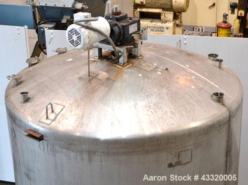 Used Tank, 1500 Gallon, 316 Stainless Steel, Vertical. Approximate 76” diameter x 72” straight side, dished top and bottom. Fixed stainless steel agitator mount with a UET agitator, model XCEL-6, out...
