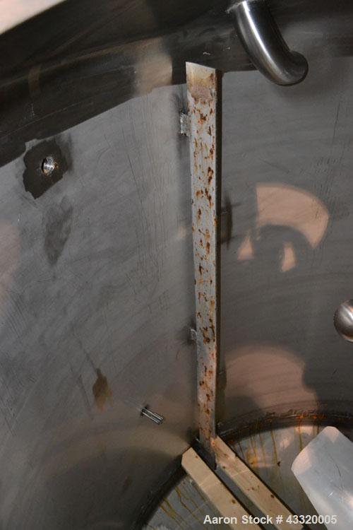 Used Tank, 1500 Gallon, 316 Stainless Steel, Vertical. Approximate 76” diameter x 72” straight side, dished top and bottom. Fixed stainless steel agitator mount with a UET agitator, model XCEL-6, out...