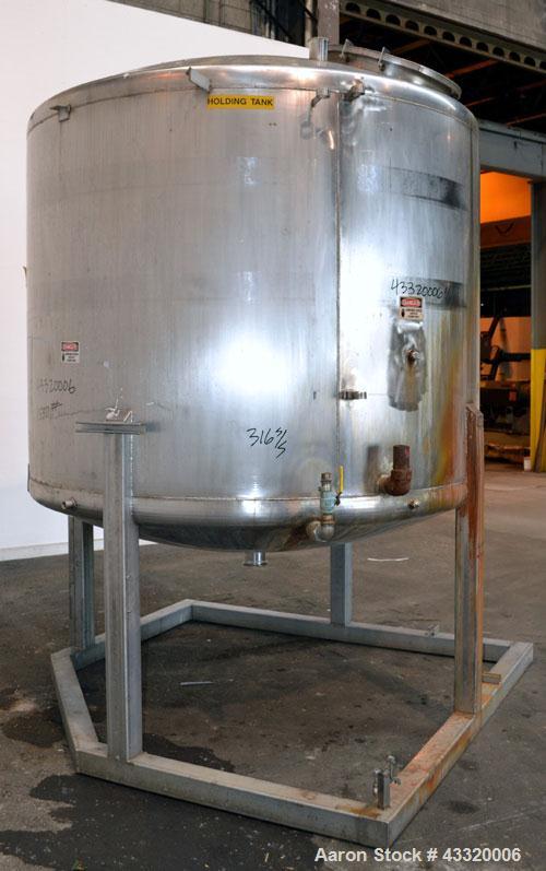 Used Tank, 1650 Gallon, 316 Stainless Steel, Vertical. Approximate 84” diameter x 60” straight side, dished top and bottom. Openings top 2” tri-clamp, (4) 3” tri-clamp, 2-1/2” tri-clamp, 23” man way ...