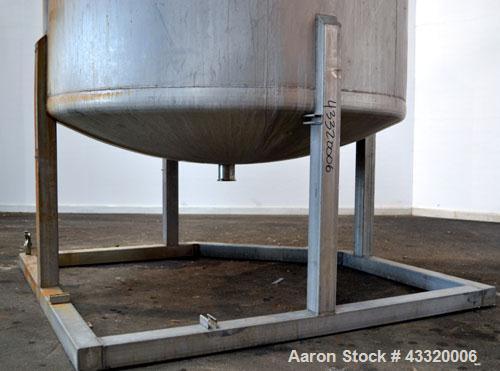 Used Tank, 1650 Gallon, 316 Stainless Steel, Vertical. Approximate 84” diameter x 60” straight side, dished top and bottom. Openings top 2” tri-clamp, (4) 3” tri-clamp, 2-1/2” tri-clamp, 23” man way ...