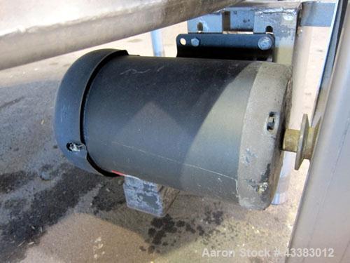 Used Tank, 1000 Gallon, 304 Stainless Steel, Vertical. Approximate 61” diameter x 81” straight side, flat top with a bolt on cover with a 1/3 hinged opening, sloped bottom. Side bottom entering agita...