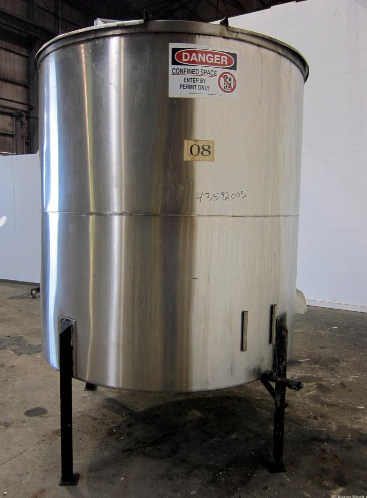 Used Tank, 1100 Gallon, 304 Stainless Steel, Vertical. Approximately 68” diameter x 70” straight side, flat top with (2) 1/3 hinged covers, coned bottom. Fixed stainless steel agitator bridge. Approx...