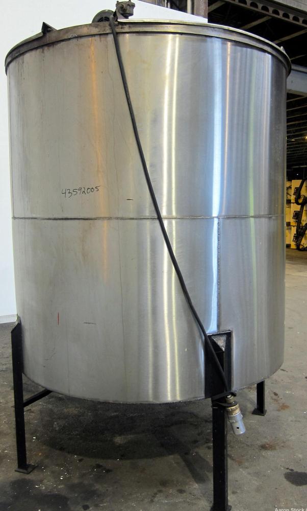 Used Tank, 1100 Gallon, 304 Stainless Steel, Vertical. Approximately 68” diameter x 70” straight side, flat top with (2) 1/3 hinged covers, coned bottom. Fixed stainless steel agitator bridge. Approx...
