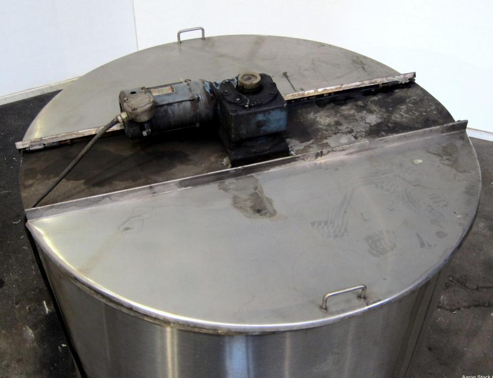 Used Tank, 1100 Gallon, 304 Stainless Steel, Vertical. Approximately 68” diameter x 70” straight side, flat top with (2) 1/3 hinged covers, coned bottom. Fixed stainless steel agitator bridge. Approx...