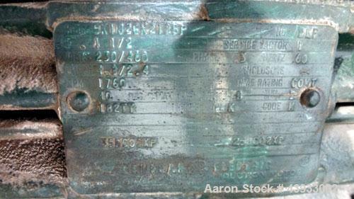 Used Tank, 1050 Gallon, 304 Stainless Steel, Vertical.  Approximately 62” diameter x 82” straight side.  Dished top, sloped bottom.  Off-center top entering Lightnin agitator, model N33G-150.  1-1/2”...