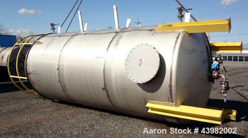 Used Tank, 4000 Gallon, 304 Stainless Steel, Vertical.  Approximately 82" diameter x 180" straight side, flat welded top, dished bottom.  Top mounted Eastern agitator, model APDS-3M. Approximately 2-...