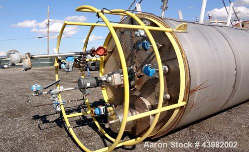 Used Tank, 4000 Gallon, 304 Stainless Steel, Vertical.  Approximately 82" diameter x 180" straight side, flat welded top, dished bottom.  Top mounted Eastern agitator, model APDS-3M. Approximately 2-...