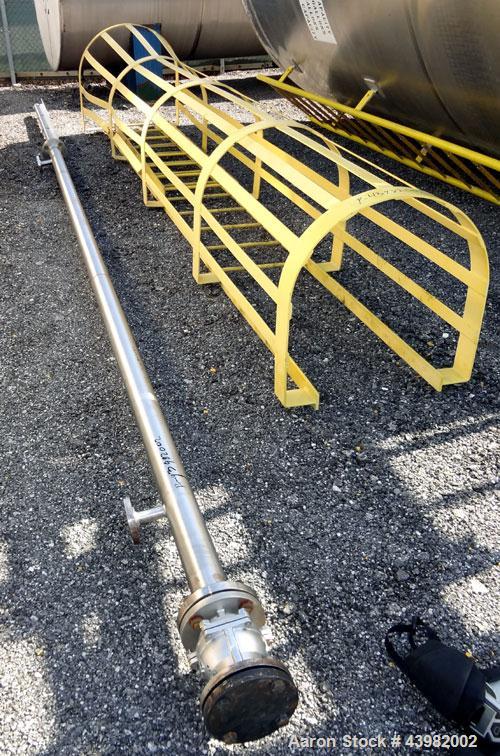 Used Tank, 4000 Gallon, 304 Stainless Steel, Vertical.  Approximately 82" diameter x 180" straight side, flat welded top, dished bottom.  Top mounted Eastern agitator, model APDS-3M. Approximately 2-...