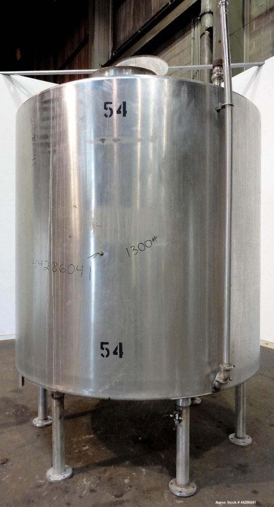 Used Tank, 2000 Gallon, 304 Stainless Steel, Vertical. 84" Diameter x 80" straight side. Dished top, coned bottom. Openings top (2) 2”, 4”, 18” man way with cover, side 2”. 3" Center bottom outlet. M...