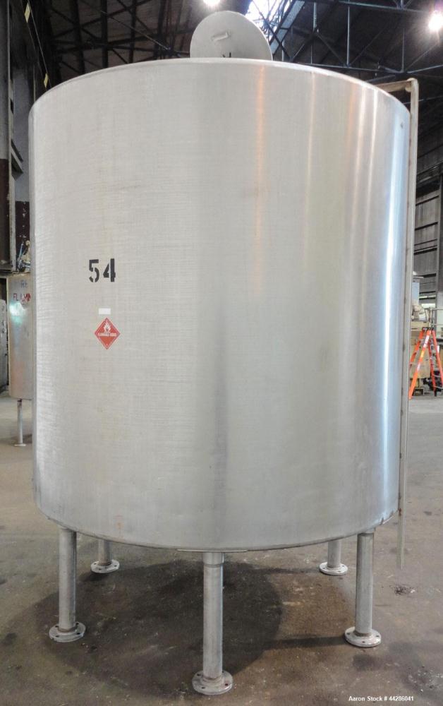Used Tank, 2000 Gallon, 304 Stainless Steel, Vertical. 84" Diameter x 80" straight side. Dished top, coned bottom. Openings top (2) 2”, 4”, 18” man way with cover, side 2”. 3" Center bottom outlet. M...