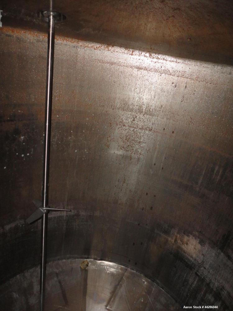 Used Tank, 2000 Gallon, 304 Stainless Steel, Vertical. 84" Diameter x 80" straight side. Dished top, coned bottom. Off center air operated Lightnin agitator, model XJAC-100, serial# R0133919201. 1-1/...