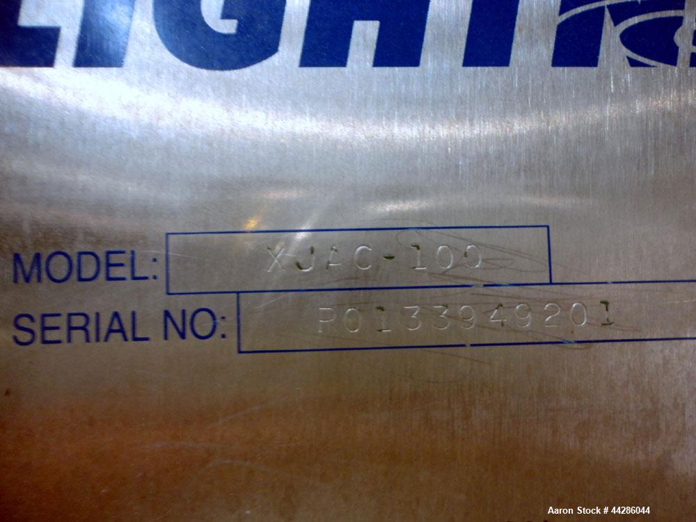 Used Tank, 2000 Gallon, 304 Stainless Steel, Vertical. 84" Diameter x 80" straight side. Dished top, coned bottom. Off center air operated Lightnin agitator, model XJAC-100, serial# R0133919201. 1-1/...