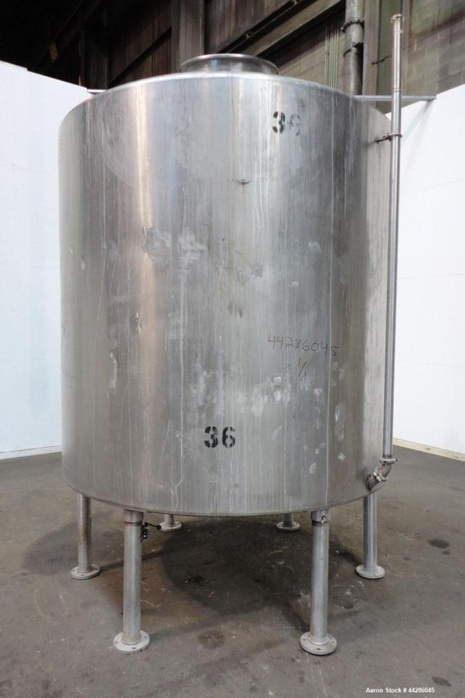 Used Tank, 2000 Gallon, 304 Stainless Steel, Vertical. 84" Diameter x 80" straight side. Dished top, coned bottom. Off center air operated Lightnin agitator, model XJAC-100, serial# 95/E49459-02. 1-1...