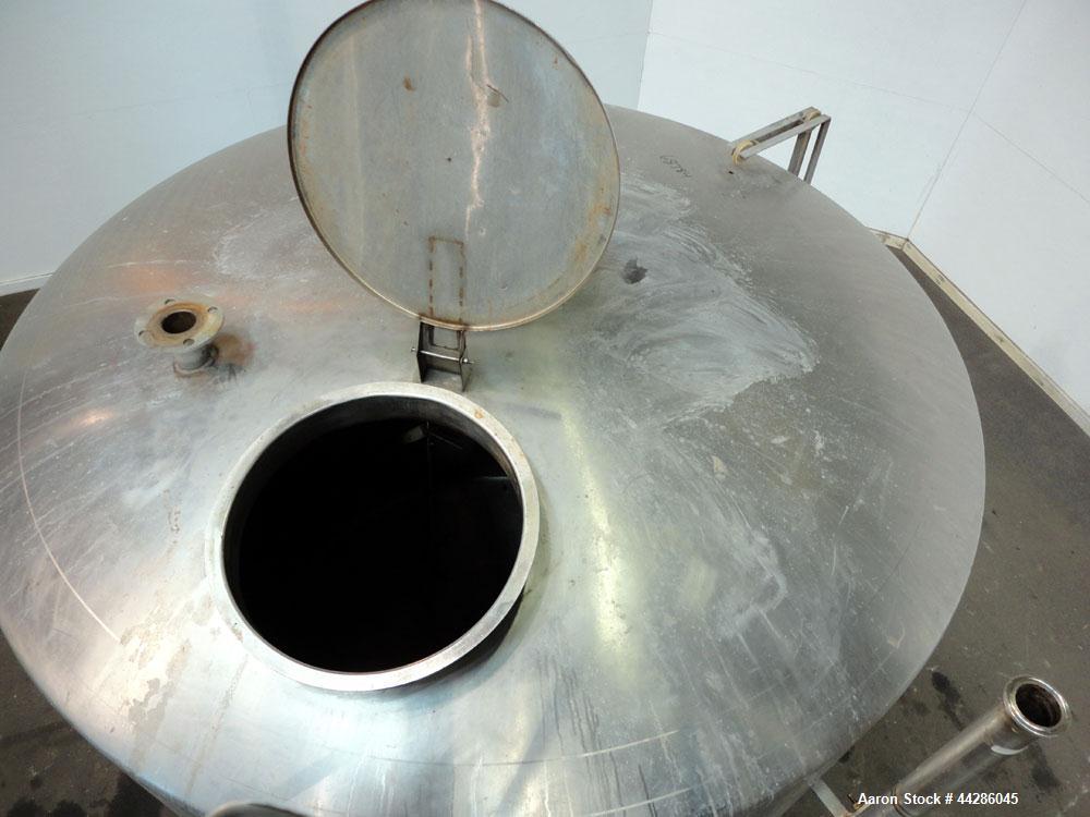 Used Tank, 2000 Gallon, 304 Stainless Steel, Vertical. 84" Diameter x 80" straight side. Dished top, coned bottom. Off center air operated Lightnin agitator, model XJAC-100, serial# 95/E49459-02. 1-1...