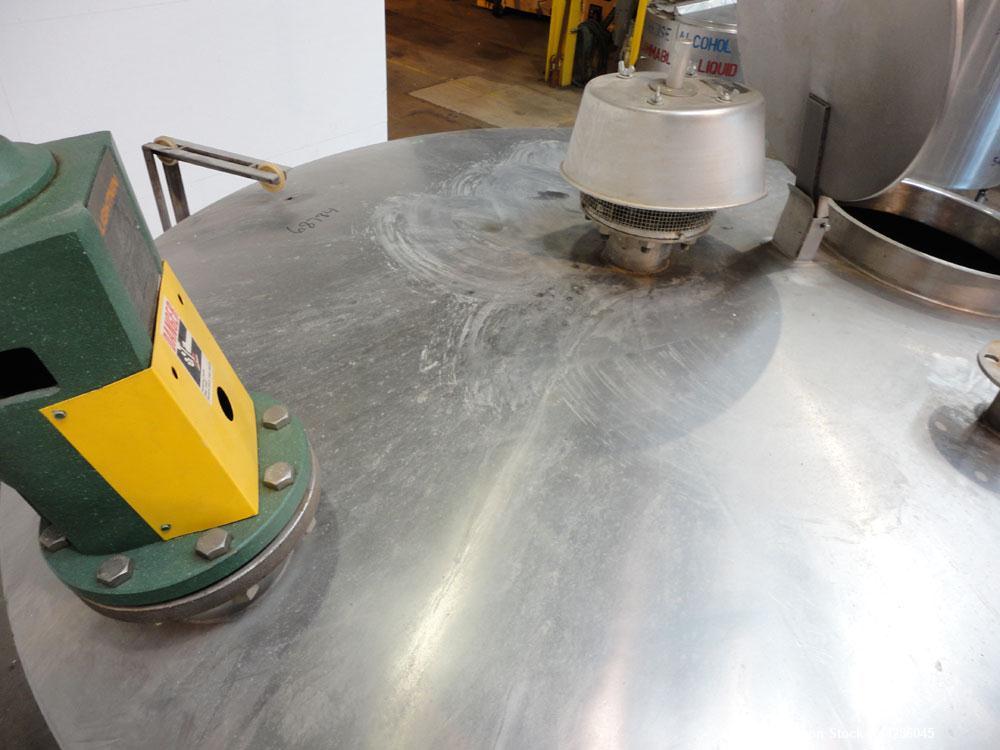 Used Tank, 2000 Gallon, 304 Stainless Steel, Vertical. 84" Diameter x 80" straight side. Dished top, coned bottom. Off center air operated Lightnin agitator, model XJAC-100, serial# 95/E49459-02. 1-1...