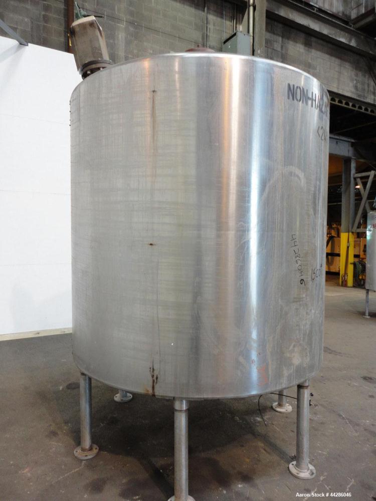 Used Tank, 2000 Gallon, 304 Stainless Steel, Vertical. 84" Diameter x 80" straight side. Dished top, coned bottom. Off center air operated Lightnin agitator, serial# 95/E61633. 1-1/2” Diameter shaft ...