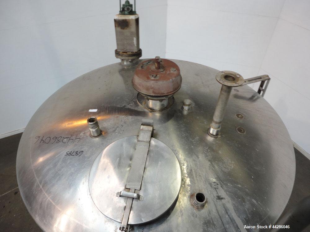Used Tank, 2000 Gallon, 304 Stainless Steel, Vertical. 84" Diameter x 80" straight side. Dished top, coned bottom. Off center air operated Lightnin agitator, serial# 95/E61633. 1-1/2” Diameter shaft ...