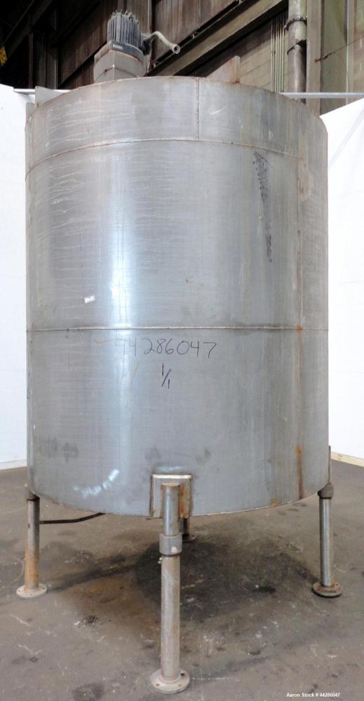 Used Tank, 1500 Gallon, 321 Stainless Steel, Vertical. 74" Diameter x 84" straight side. Flat top, coned bottom. Off center Lightnin agitator, model ND-4A, serial# 6917791. 1-1/2" Diameter shaft with...