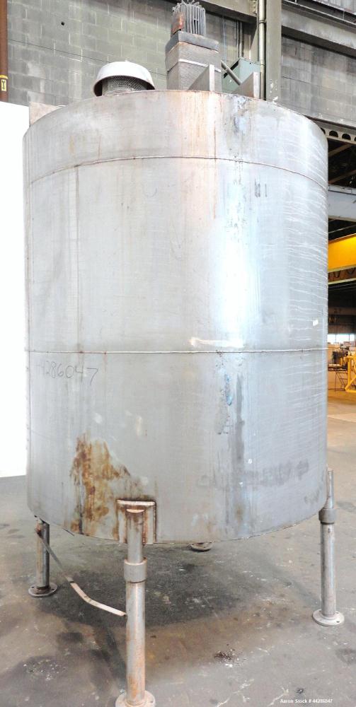 Used Tank, 1500 Gallon, 321 Stainless Steel, Vertical. 74" Diameter x 84" straight side. Flat top, coned bottom. Off center Lightnin agitator, model ND-4A, serial# 6917791. 1-1/2" Diameter shaft with...