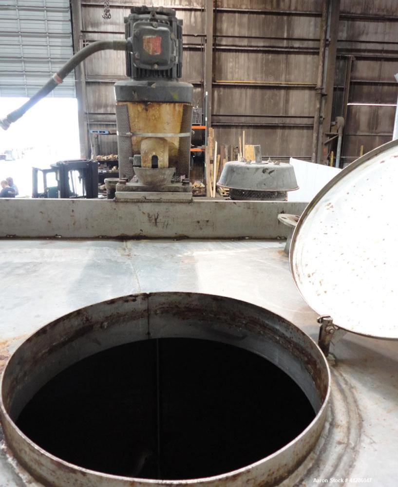 Used Tank, 1500 Gallon, 321 Stainless Steel, Vertical. 74" Diameter x 84" straight side. Flat top, coned bottom. Off center Lightnin agitator, model ND-4A, serial# 6917791. 1-1/2" Diameter shaft with...