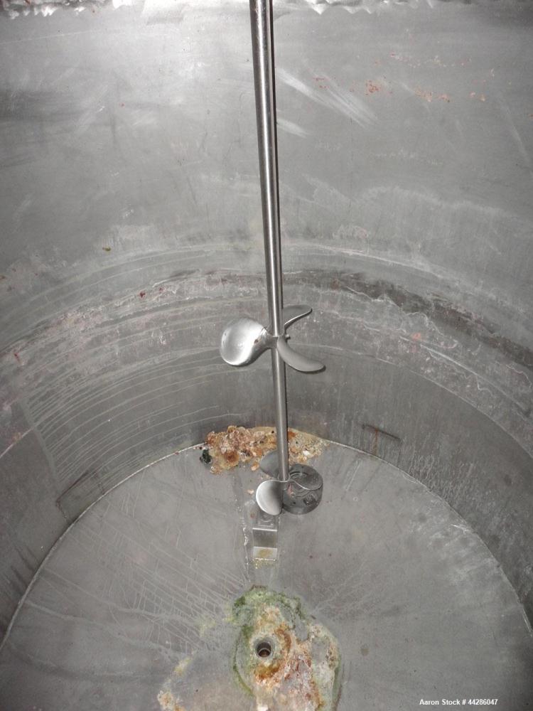 Used Tank, 1500 Gallon, 321 Stainless Steel, Vertical. 74" Diameter x 84" straight side. Flat top, coned bottom. Off center Lightnin agitator, model ND-4A, serial# 6917791. 1-1/2" Diameter shaft with...