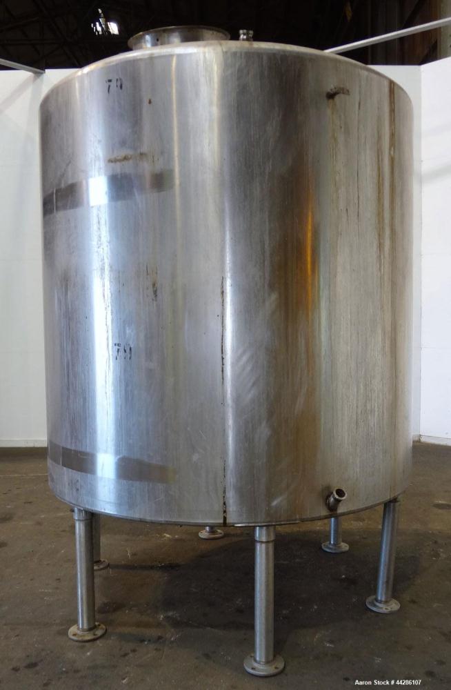 Used- Tank, 2000 Gallon, 304 Stainless Steel, Vertical. 84" Diameter x 80" straight side. Dished top, coned bottom. Openings...