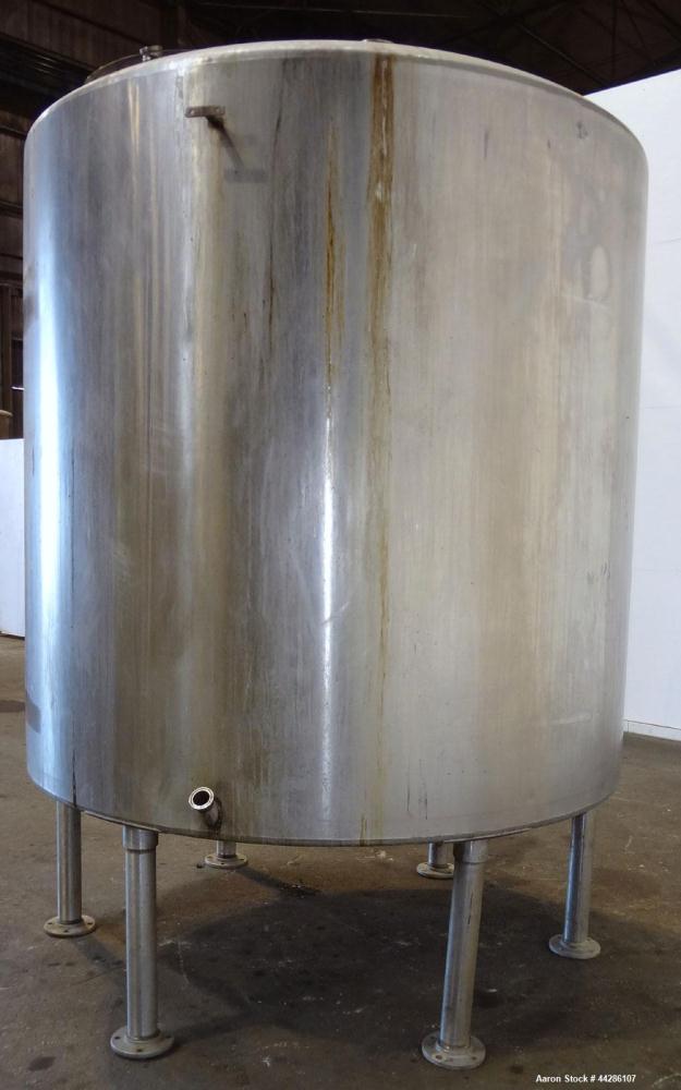 Used- Tank, 2000 Gallon, 304 Stainless Steel, Vertical. 84" Diameter x 80" straight side. Dished top, coned bottom. Openings...