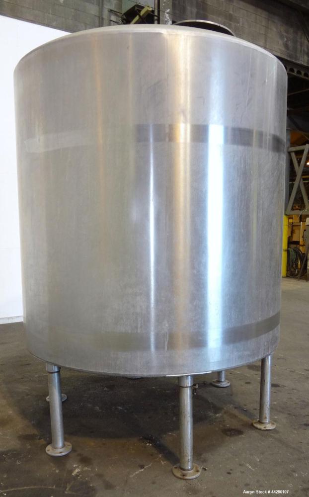 Used- Tank, 2000 Gallon, 304 Stainless Steel, Vertical. 84" Diameter x 80" straight side. Dished top, coned bottom. Openings...