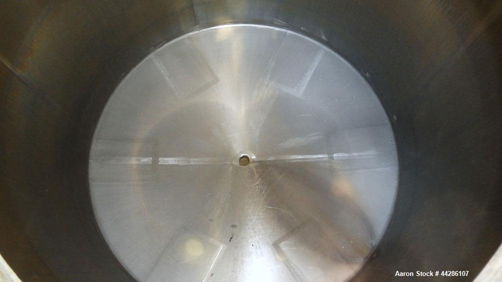 Used- Tank, 2000 Gallon, 304 Stainless Steel, Vertical. 84" Diameter x 80" straight side. Dished top, coned bottom. Openings...