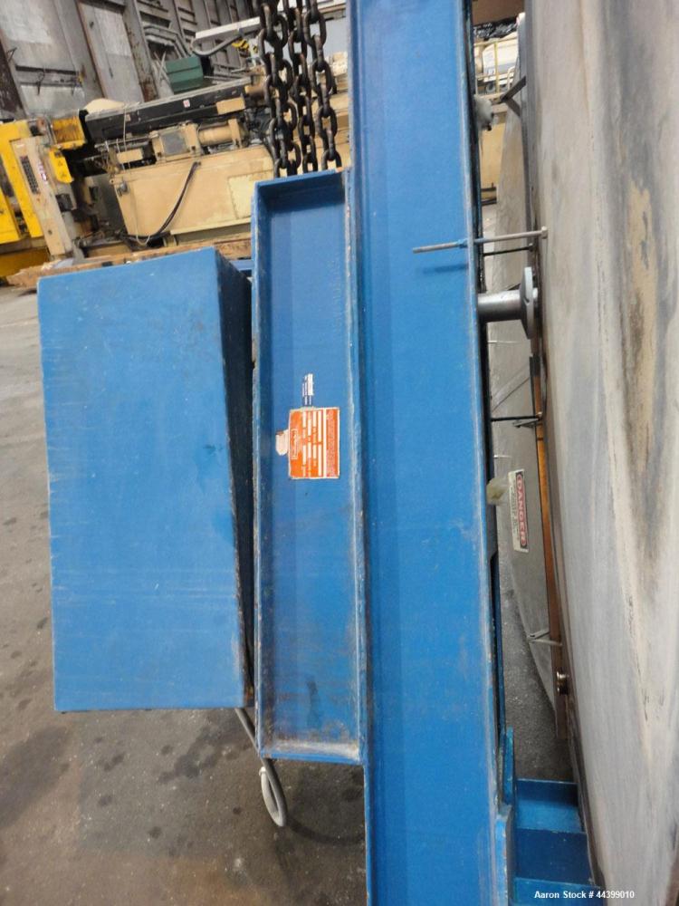 Used Tank, 3400 Gallon, 304 Stainless Steel, Vertical. Approximate 84” diameter x 143” straight side, flat top with 1/3 hinged cover, sloped bottom. Fixed carbon steel agitator bridge with a top ente...