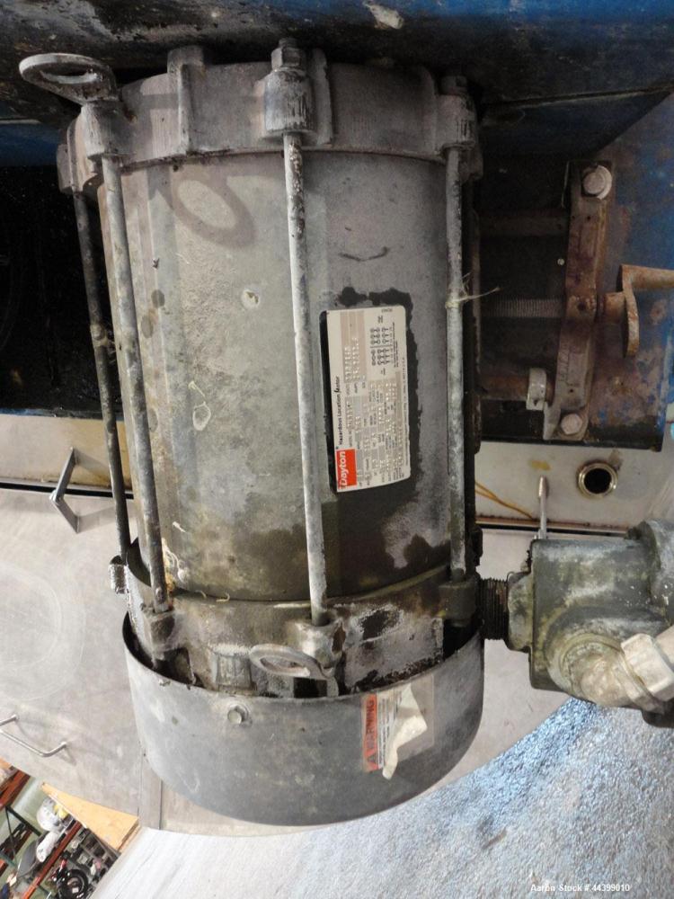 Used Tank, 3400 Gallon, 304 Stainless Steel, Vertical. Approximate 84” diameter x 143” straight side, flat top with 1/3 hinged cover, sloped bottom. Fixed carbon steel agitator bridge with a top ente...