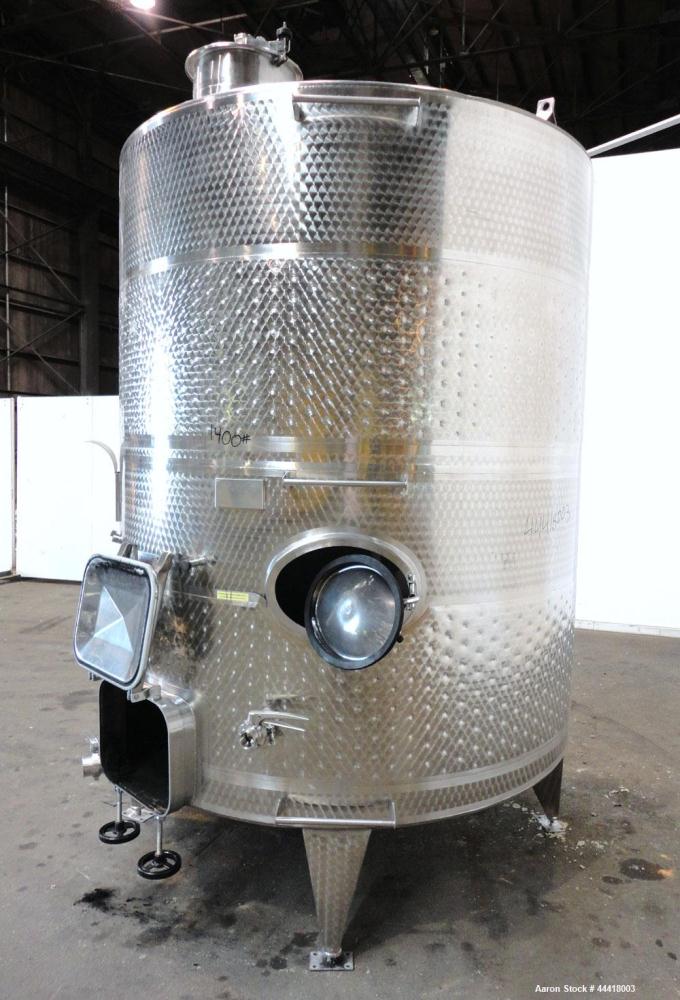 Used Vinquip Jacketed Beverage Tank,  2284 Gallon, 304 Stainless Steel, Vertical. Approximately 83” diameter x 97-1/2” straight side, off center coned top, sloped bottom.  (1) 24” Wide bottom sidewal...