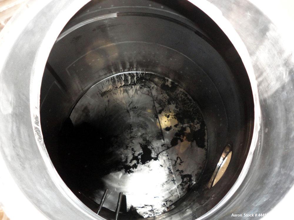 Used Vinquip Jacketed Beverage Tank,  2284 Gallon, 304 Stainless Steel, Vertical. Approximately 83” diameter x 97-1/2” straight side, off center coned top, sloped bottom.  (1) 24” Wide bottom sidewal...