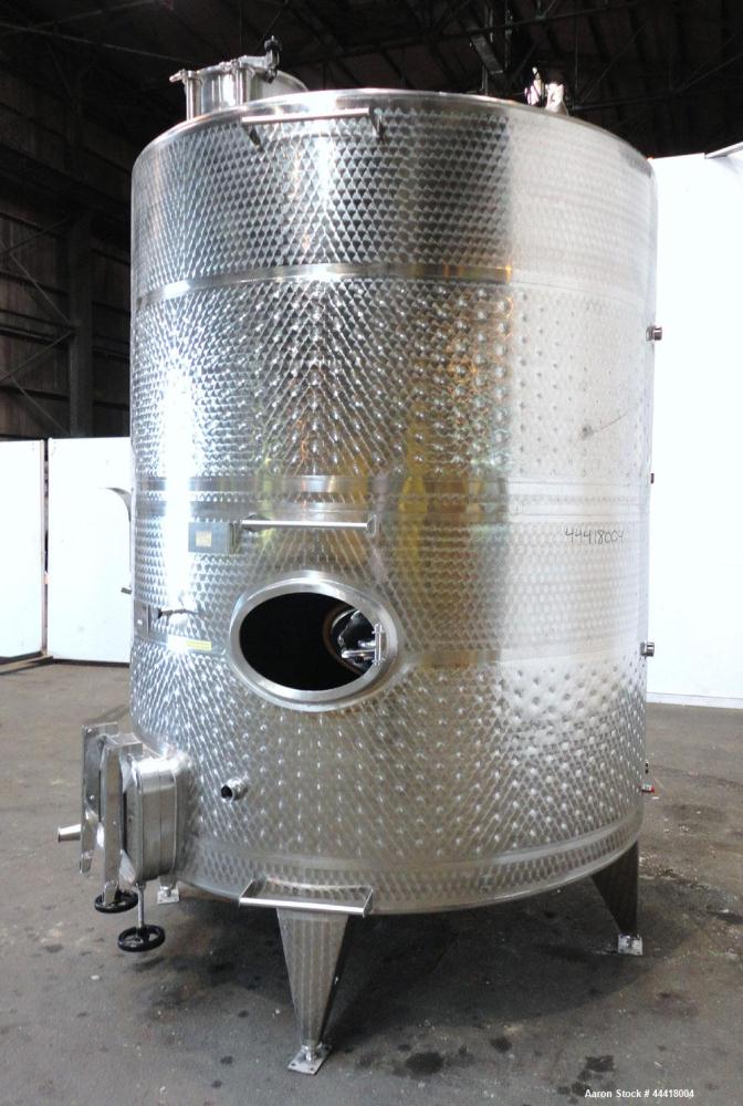 Used Vinquip Jacketed Beverage Tank,  2284 Gallon, 304 Stainless Steel, Vertical. Approximately 83” diameter x 97-1/2” straight side, off center coned top, sloped bottom. (1) 24” Wide bottom sidewall...
