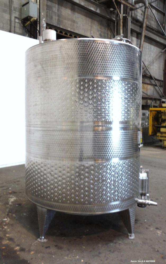 Used Vinquip Jacketed Beverage Tank,  2284 Gallon, 304 Stainless Steel, Vertical. Approximately 83” diameter x 97-1/2” straight side, off center coned top, sloped bottom. (1) 24” Wide bottom sidewall...
