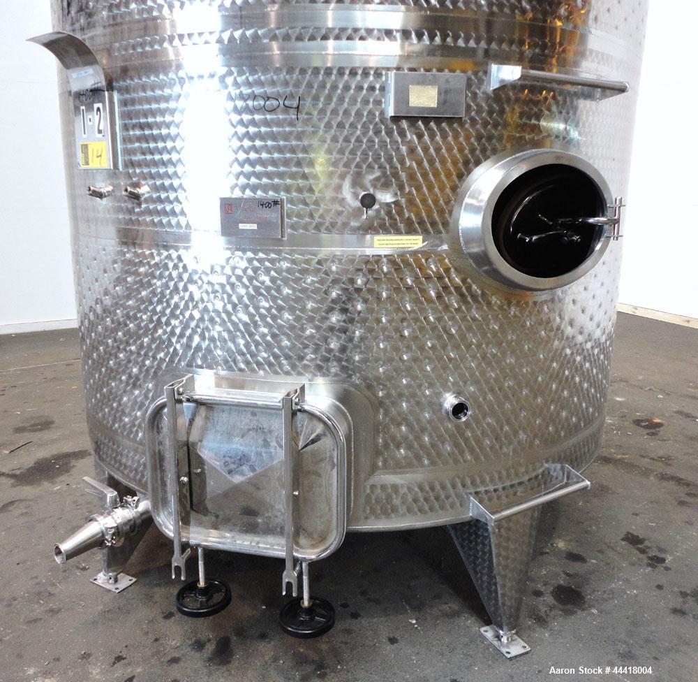 Used Vinquip Jacketed Beverage Tank,  2284 Gallon, 304 Stainless Steel, Vertical. Approximately 83” diameter x 97-1/2” straight side, off center coned top, sloped bottom. (1) 24” Wide bottom sidewall...