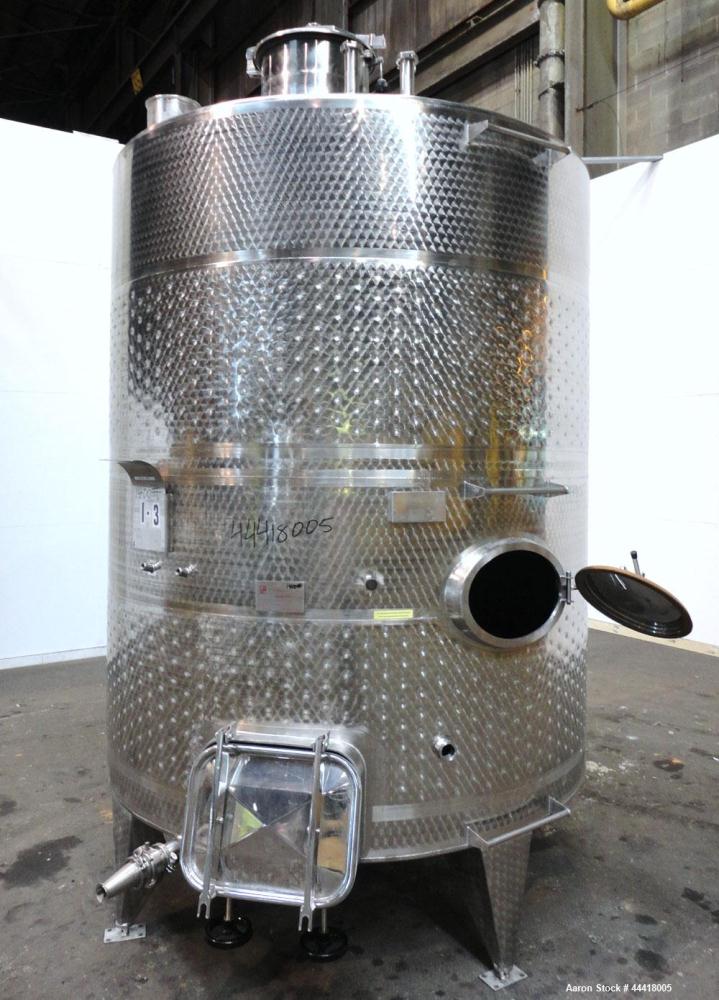 Used Vinquip Jacketed Beverage Tank,  2284 Gallon, 304 Stainless Steel, Vertical. Approximately 83” diameter x 97-1/2” straight side, off center coned top, sloped bottom. (1) 24” Wide bottom sidewall...