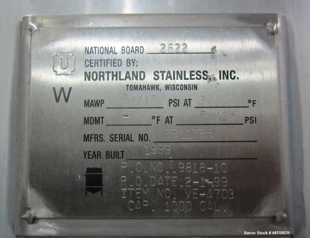 Used Northland Stainless Pressure Tank, 1000 Gallon, 316L Stainless Steel, Vertical. Internal rated for 15 psi & Full Vacuum at 300 degrees F.  Welded dish heads, mounted on (4) legs. Serial # 991178...