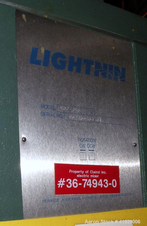 Used Norwalk Tank, 2000 Gallon,  stainless steel, vertical. 76" diameter x 106" straight side, dished top and bottom. Off center top entering angled Lightnin agitator, model XJC-350. 1-1/2" diameter ...