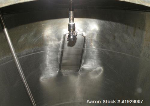 Used Norwalk Tank, 2000 Gallon, 316 Stainless Steel, Vertical. 76" diameter x 106" straight side, 304 stainless steel dished top, 316 dished bottom. Off center top entering angled Lightnin manual var...