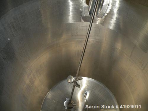 Used Norwalk Tank, 2000 Gallon,  stainless steel, vertical. 76" diameter x 106" straight side, dished top and bottom. Top side wall entering angled Lightnin manual variable speed agitator, model N33G...