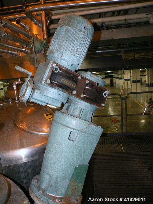 Used Norwalk Tank, 2000 Gallon,  stainless steel, vertical. 76" diameter x 106" straight side, dished top and bottom. Top side wall entering angled Lightnin manual variable speed agitator, model N33G...