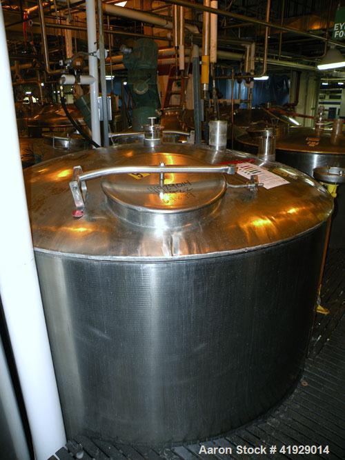 Used Norwalk Tank, 2000 Gallon,  stainless steel, vertical. 76" diameter x 106" straight side, dished top and bottom. Top side wall entering angled Lightnin manual variable speed agitator, model N33G...