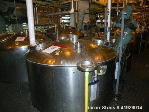 Used Norwalk Tank, 2000 Gallon,  stainless steel, vertical. 76" diameter x 106" straight side, dished top and bottom. Top side wall entering angled Lightnin manual variable speed agitator, model N33G...