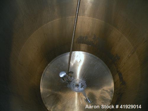 Used Norwalk Tank, 2000 Gallon,  stainless steel, vertical. 76" diameter x 106" straight side, dished top and bottom. Top side wall entering angled Lightnin manual variable speed agitator, model N33G...