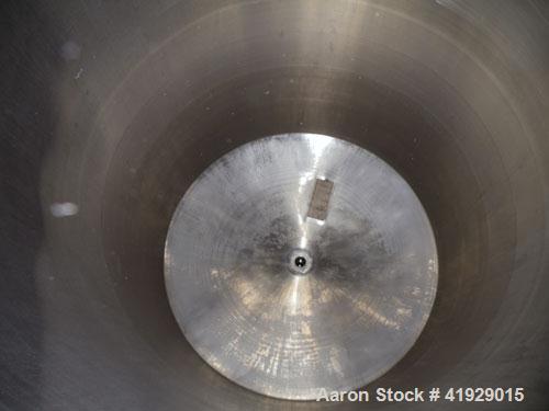 Used Norwalk Tank, 2000 Gallon,  Stainless Steel, Vertical. 76" diameter x 106" straight side, dished top and bottom. Openings top 4" tri-clamp, 4" vent, (2) 18" manway with cover, side 8" drive (cap...