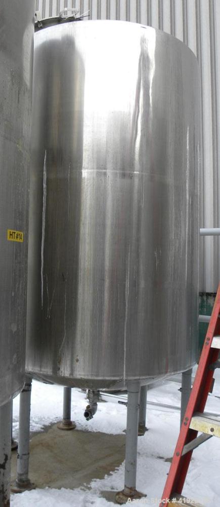Used Norwalk Tank, 2000 Gallon, 316 Stainless Steel, Vertical. 76" diameter x 106" straight side, dished top and bottom. Top side wall entering angled Lightnin agitator, model N33G-300. 1-1/2" diamet...