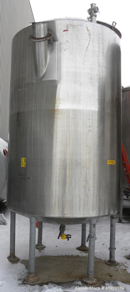 Used Norwalk Tank, 2000 Gallon, 316 Stainless Steel, Vertical. 76" diameter x 106" straight side, dished top and bottom. Top side wall entering angled Lightnin agitator, model N33G-300. 1-1/2" diamet...